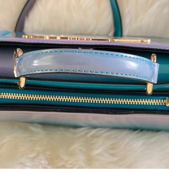 Steve Madden DT623895
TEAL/PURPLE
BEVIE-O SATCHEL ** price for 1 only
Available - Picture 2 of 4
